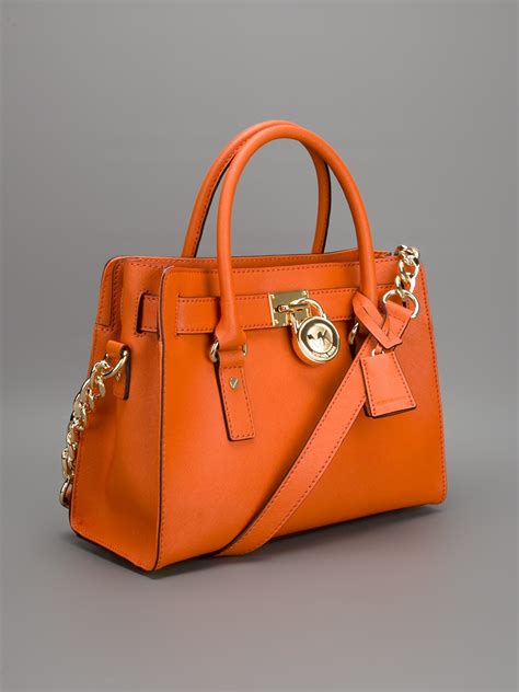 michael kors handbags orange color|Michael Kors orange purses.